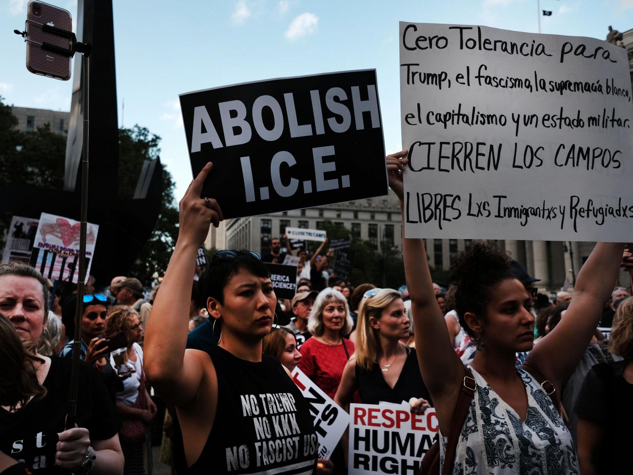Hundreds of people gather in lower Manhattan for a ‘Lights for Liberty’ protest against migrant detention camps and impending raids by Immigration and Customs Enforcement in various cities on 12 July 12 2019
