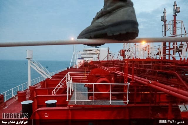 An image grab taken from a broadcast by Islamic Republic of Iran Broadcasting (IRIB) on 22 July 2019 shows a member of the Iranian Revolutionary Guards onboard tanker Stena Impero