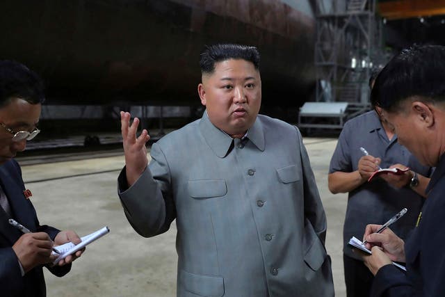 Kim Jong-un inspects a new submarine in a photo provided on Tuesday by the North Korean government. North Korea has since tested two short-range ballistic missiles