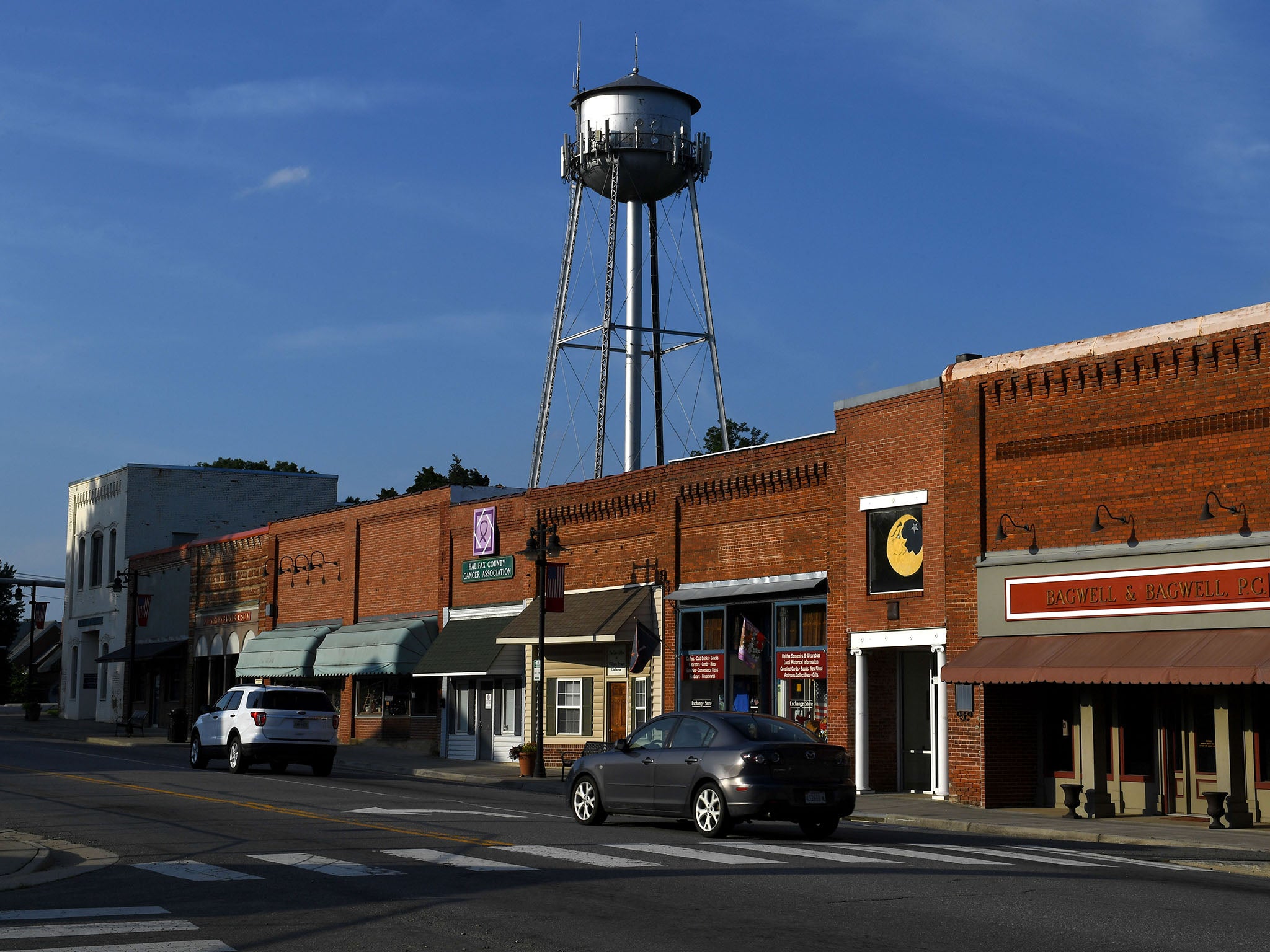 Sandwiched between empty storefronts, the Bagwell &amp; Bagwell law offices blend into their surroundings on Main Street in Halifax, Virginia