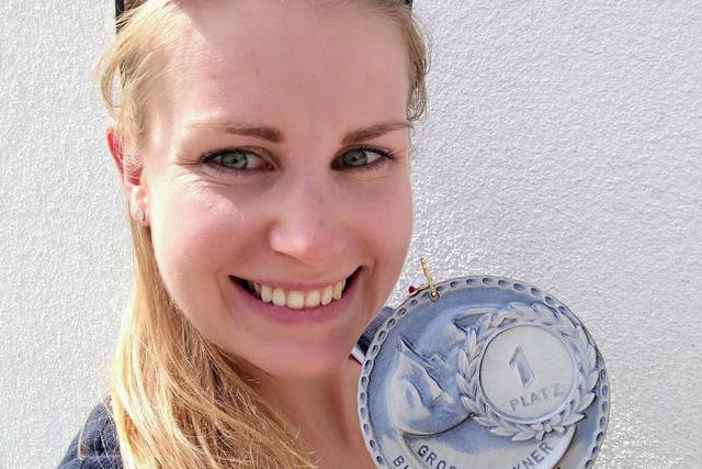 The triathlete was training on a road in southern Austria when she was hit by a car and abducted
