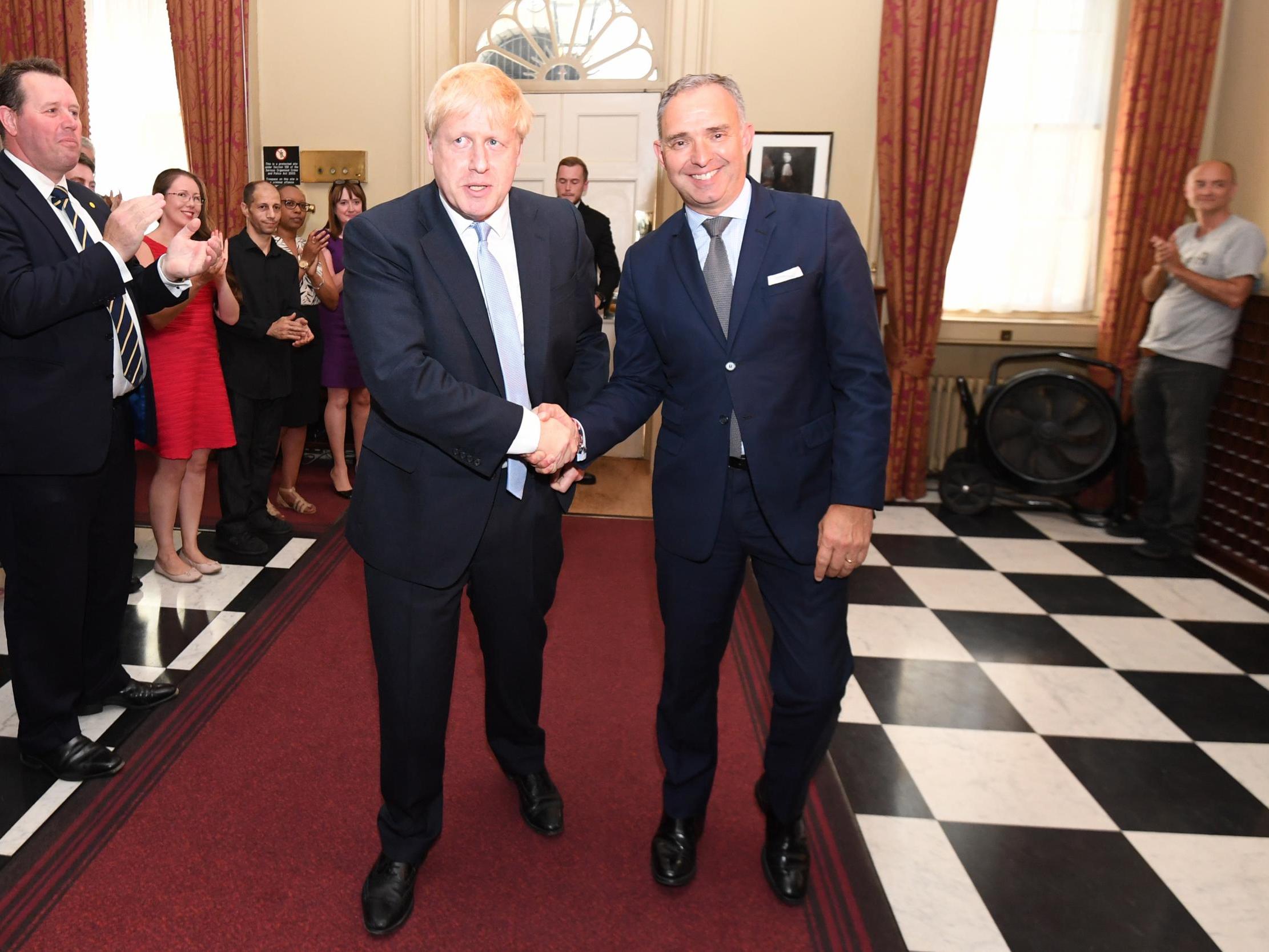 Boris Johnson shakes hands with Sir Mark Sedwill