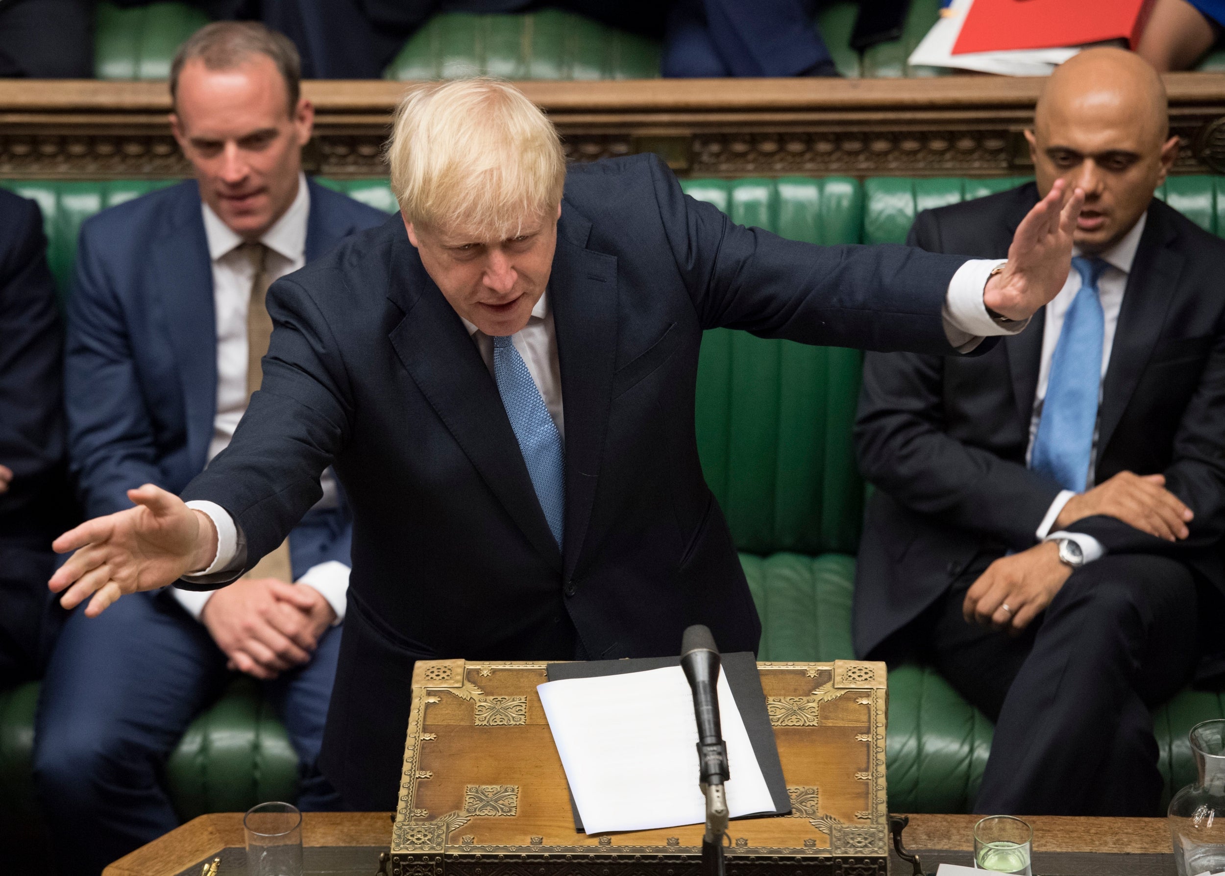 Boris Johnson gestures as he speaks in Parliament