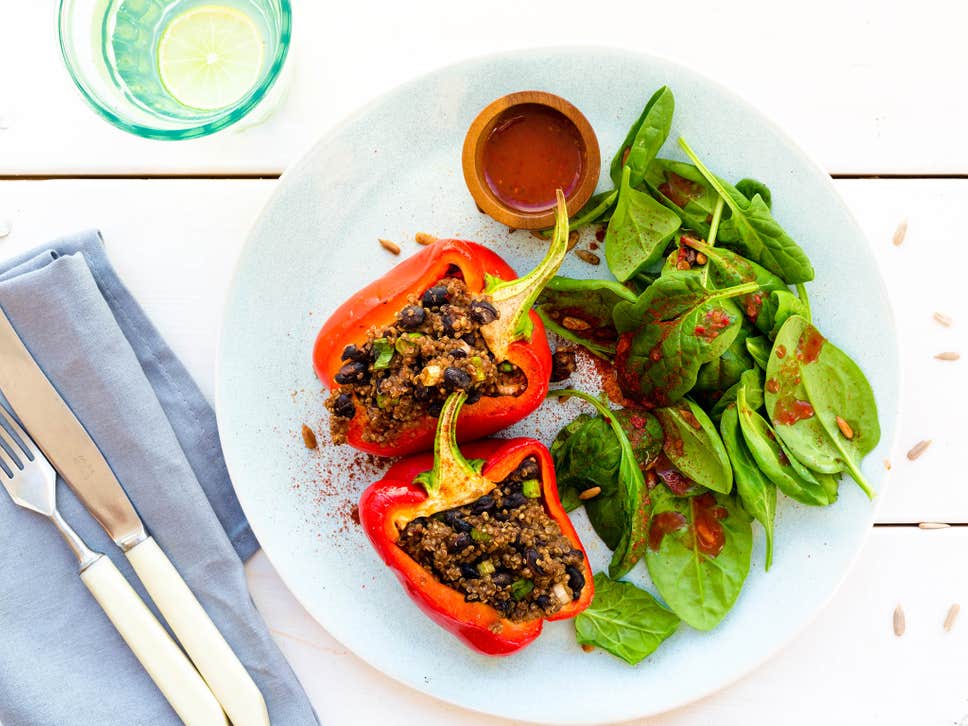 Stuffed red peppers, black beans and lime