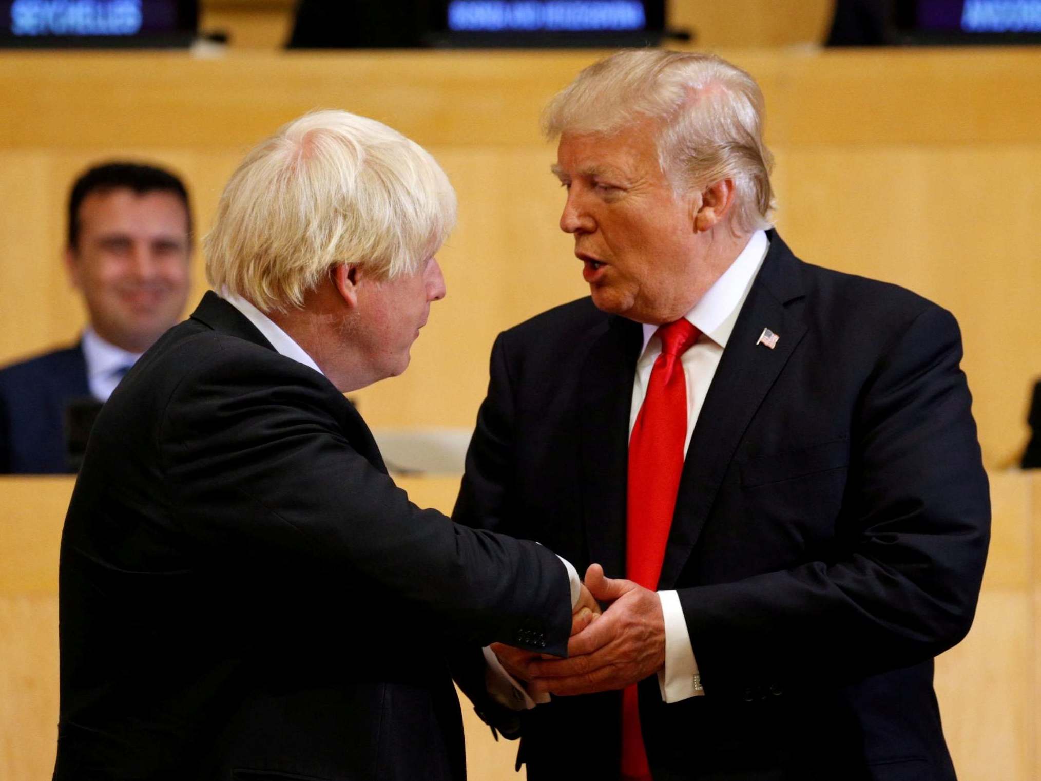 Donald Trump shakes hands with Boris Johnson while the former was foreign secretary in September, 2017