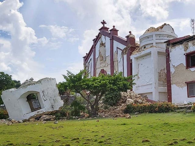 The bell tower of the 19th-century limestone church completely collapsed as a second quake hit the north of the country