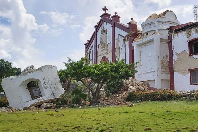 The bell tower of the 19th-century limestone church completely collapsed as a second quake hit the north of the country