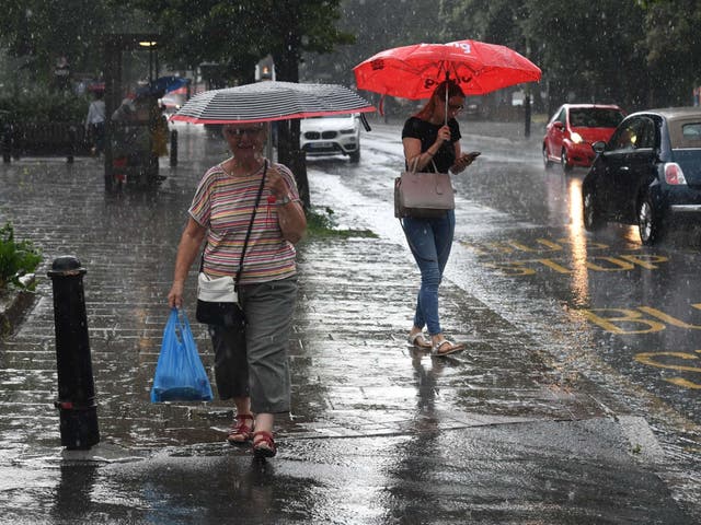 Rain falls in north London as temperatures drop following a heatwave