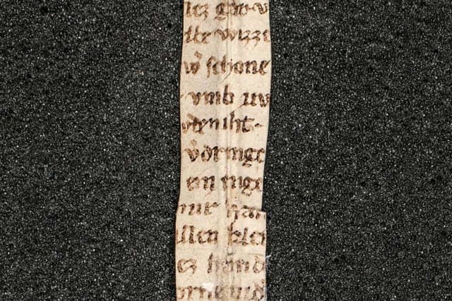 A strip of the poem ‘Der Rosendorn’ was found tied around a Latin text