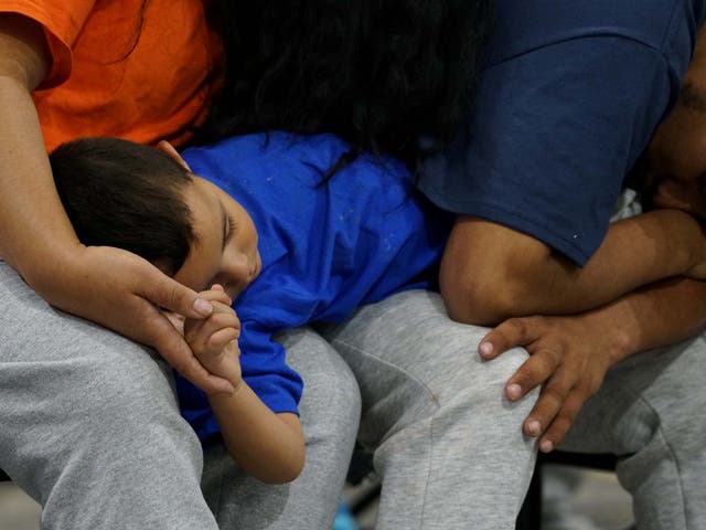 Asylum seekers wait at the Donna facility in Texas