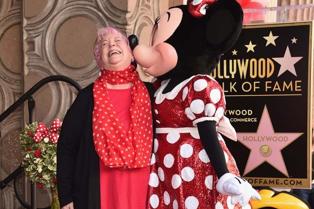 Russi Taylor poses with Minnie Mouse during a star ceremony in celebration of the 90th anniversary of Disney's Minnie Mouse at the Hollywood Walk of Fame, January 2018