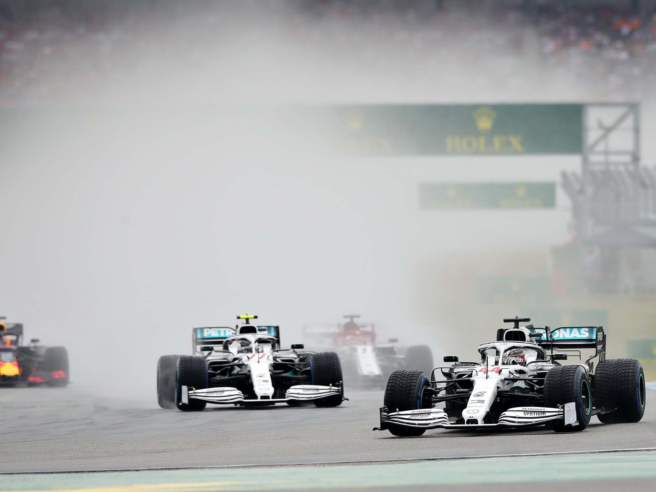 Lewis Hamilton lead the start of the German Grand Prix in he rain