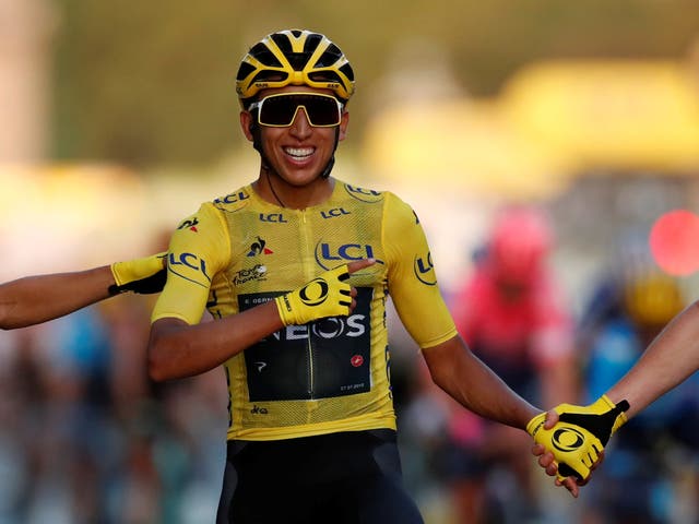 Egan Bernal crosses the line with his teammates