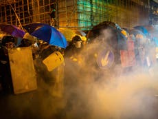 Police urge people to stay indoors over Hong Kong democracy protests
