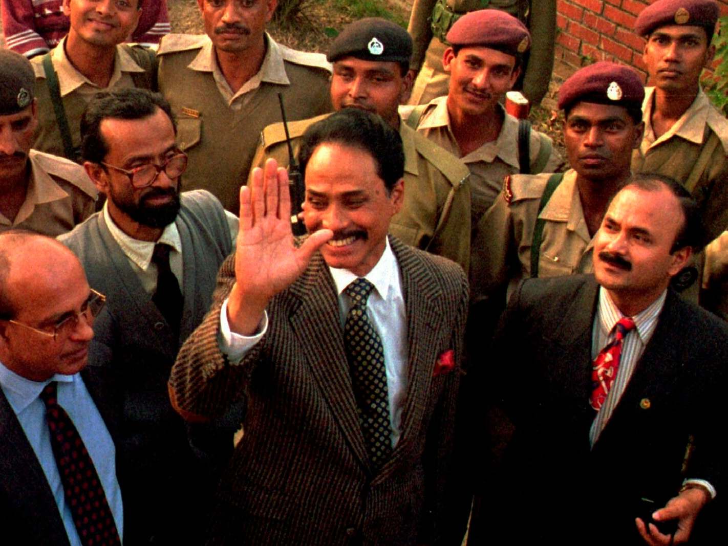 Ershad waves to supporters as he is released from prison in Dhaka in 1997