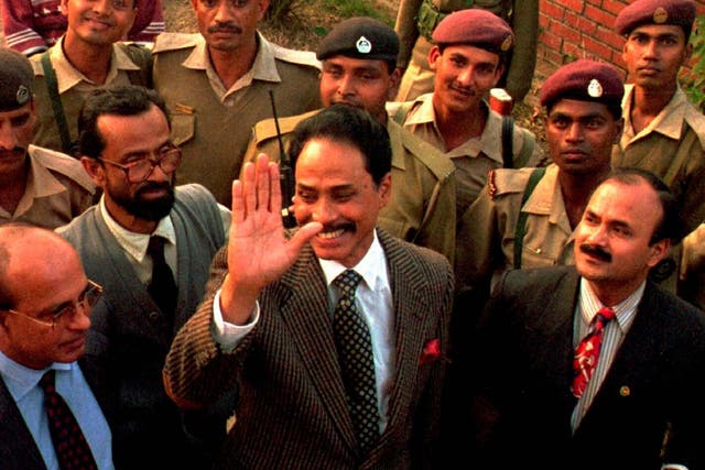 Ershad waves to supporters as he is released from prison in Dhaka in 1997
