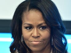 Michelle Obama issues veiled rebuke of Trump after Baltimore insults