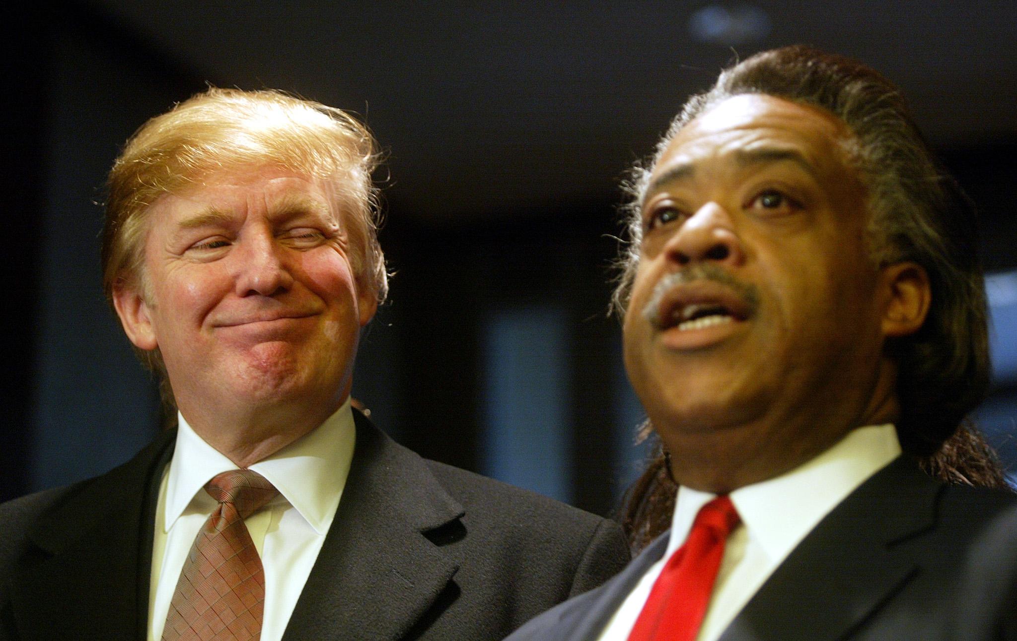Donald Trump and Rev. Al Sharpton speak at a ribbon cutting ceremony for Sharpton's National Action Network Convention April 5, 2002 in New York City