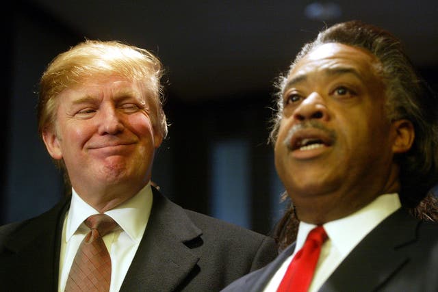 Donald Trump and Rev. Al Sharpton speak at a ribbon cutting ceremony for Sharpton's National Action Network Convention April 5, 2002 in New York City