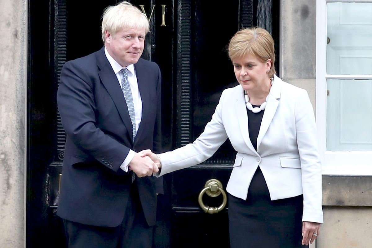 Boris Johnson and Nicola Sturgeon shake hands outside Edinburgh’s Bute House