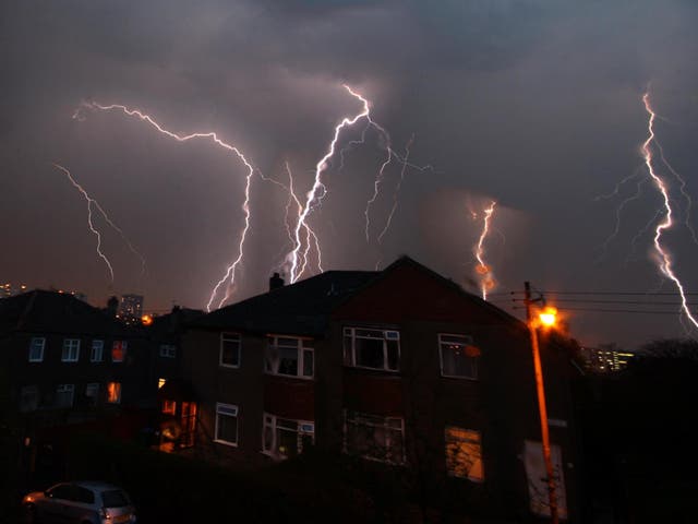 Stock image of a thunderstorm over a UK street