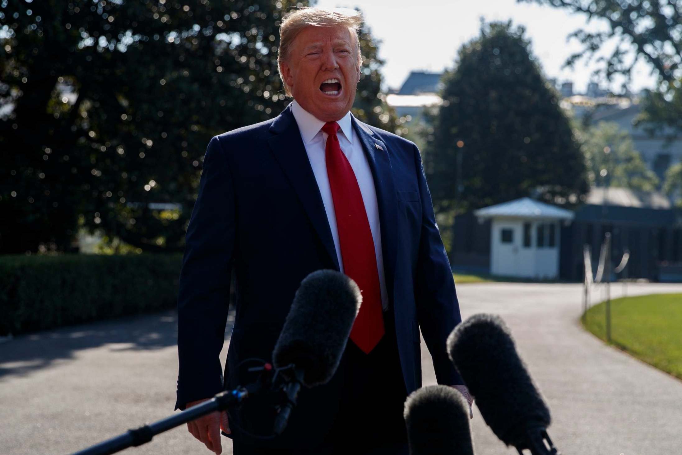 Trump news – live: President claims to be 'least racist person' as second Democratic debate looms