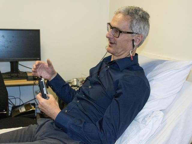 A man receiving 'tickle' therapy as part of a University of Leeds study