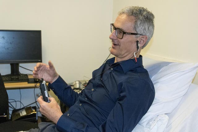 A man receiving 'tickle' therapy as part of a University of Leeds study