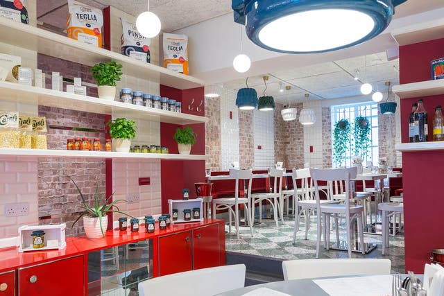 With exposed brick, white tiles and red booth style seating, the interior is a mixture of American diner and Italian cafe