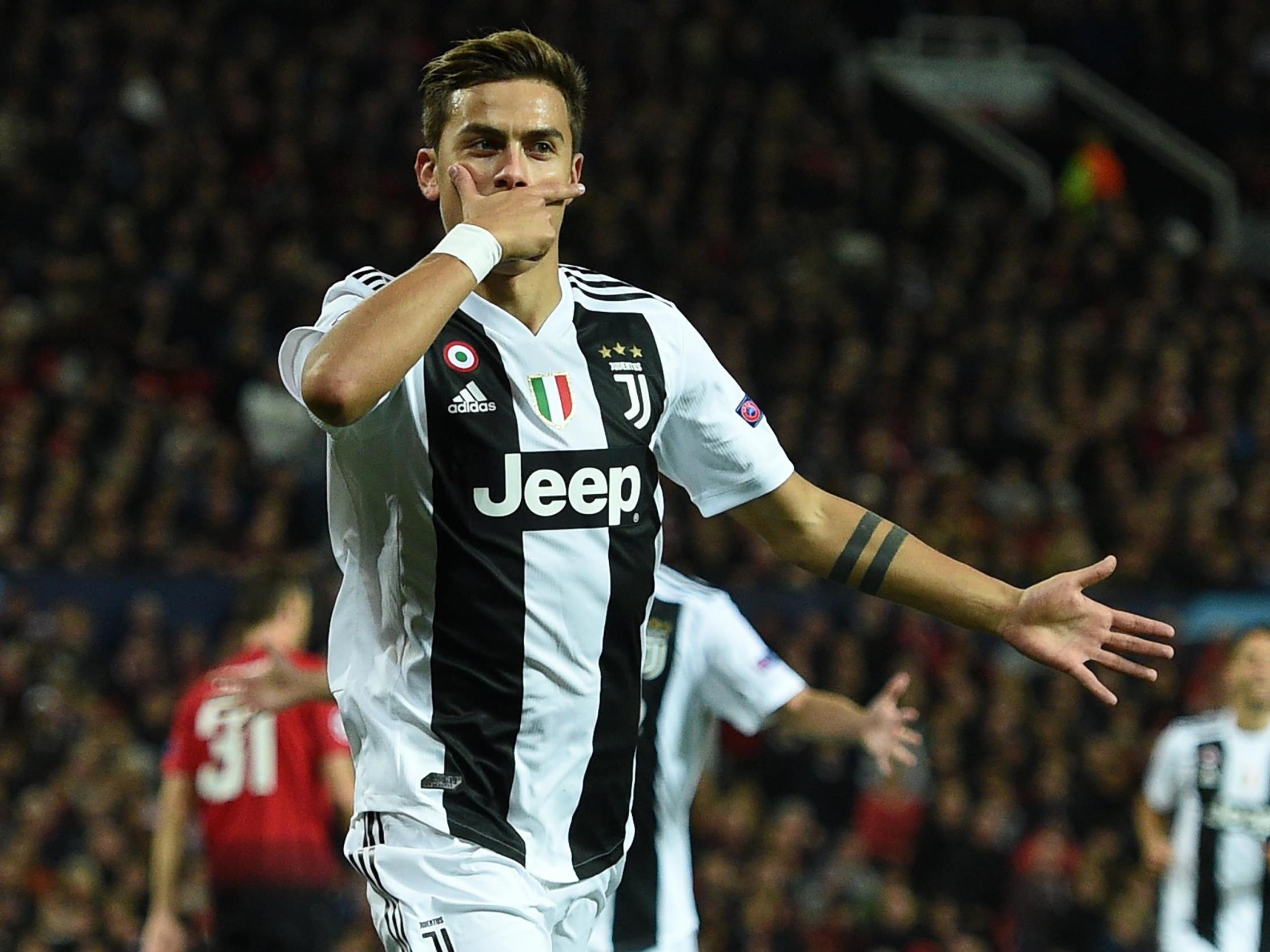 Paulo Dybala celebrates scoring at Old Trafford