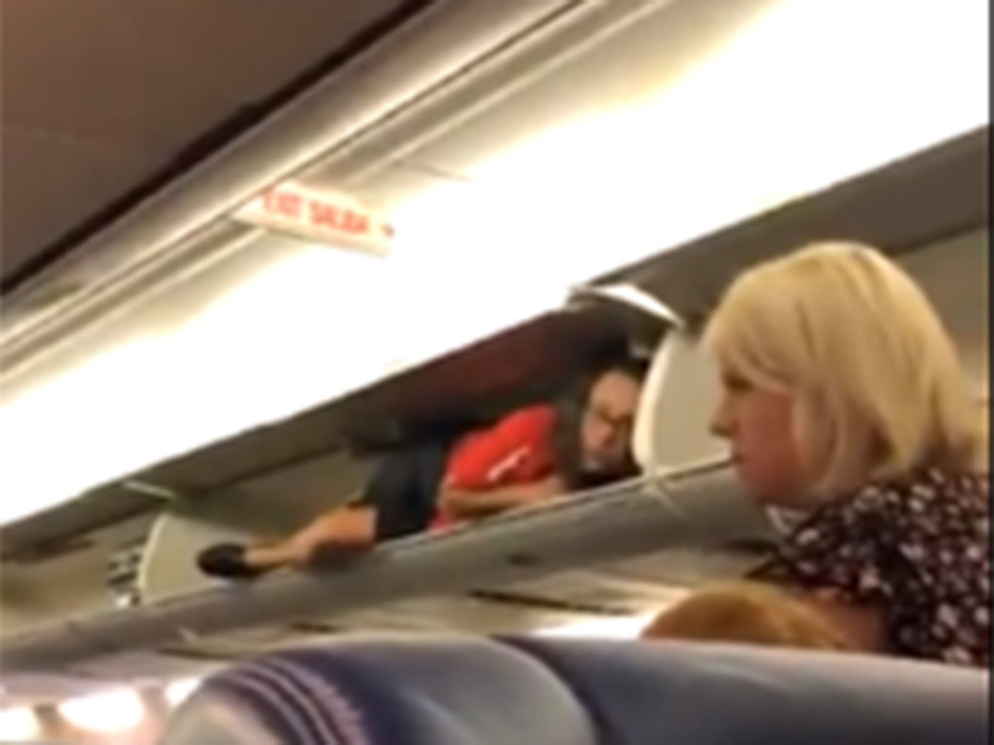 Flight attendant found hiding in overhead luggage bin: 'I can't get over how weird this is'