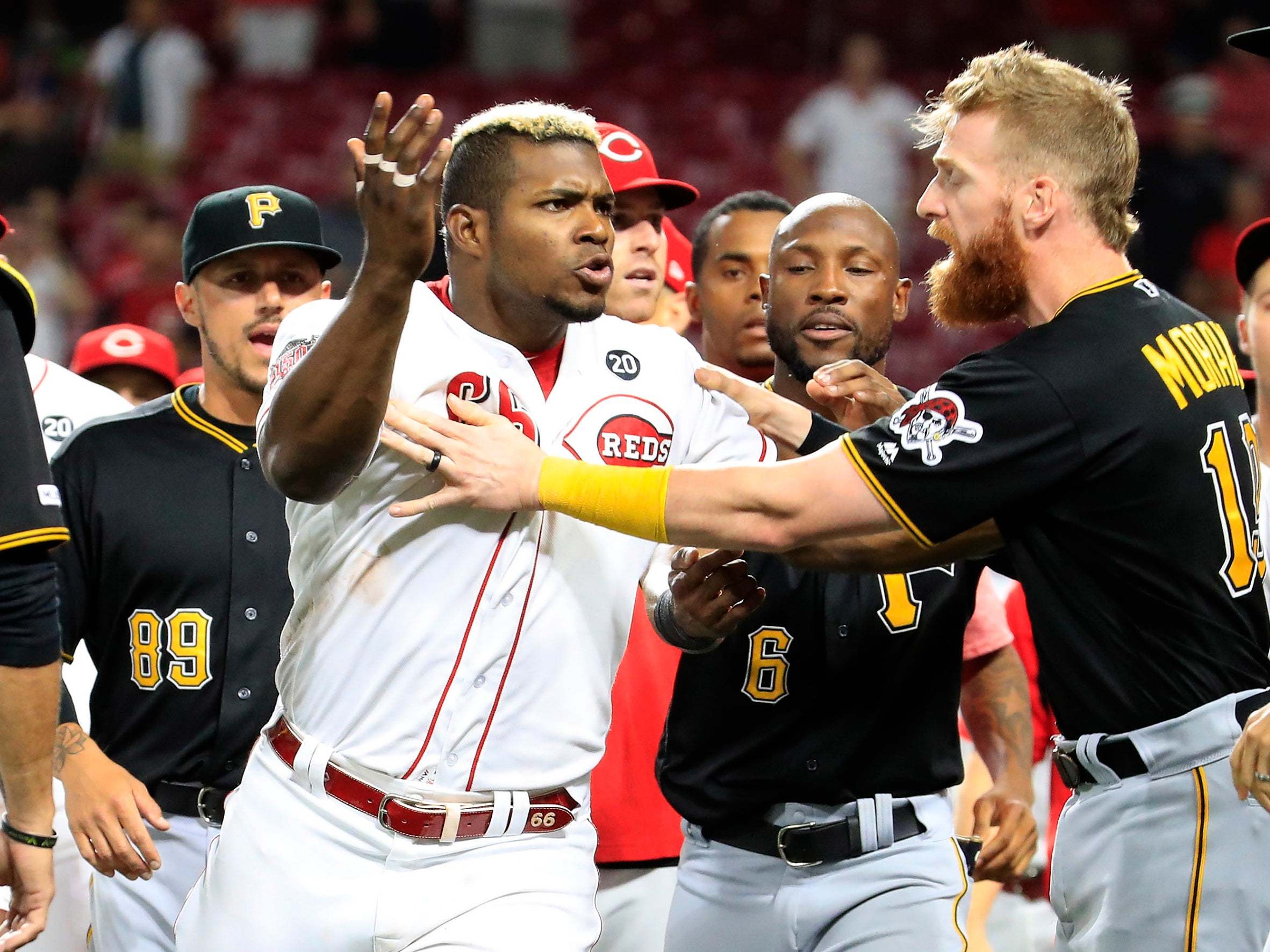 Yasiel Puig ejected in final game for Cincinatti Reds after Amir Garrett sparks five-minute mass brawl