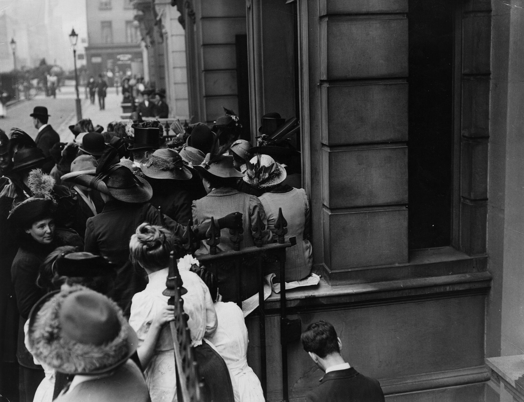 Suffragettes outside 41 Norfolk Square in 1913: the enormity of their hats were linked to female politics of the time