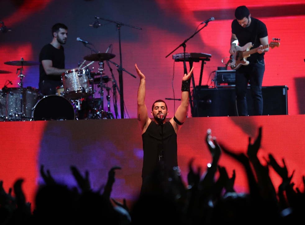 Hamed Sinno, the lead singer of Mashrou' Leila, performs on stage in Dubai in 2017