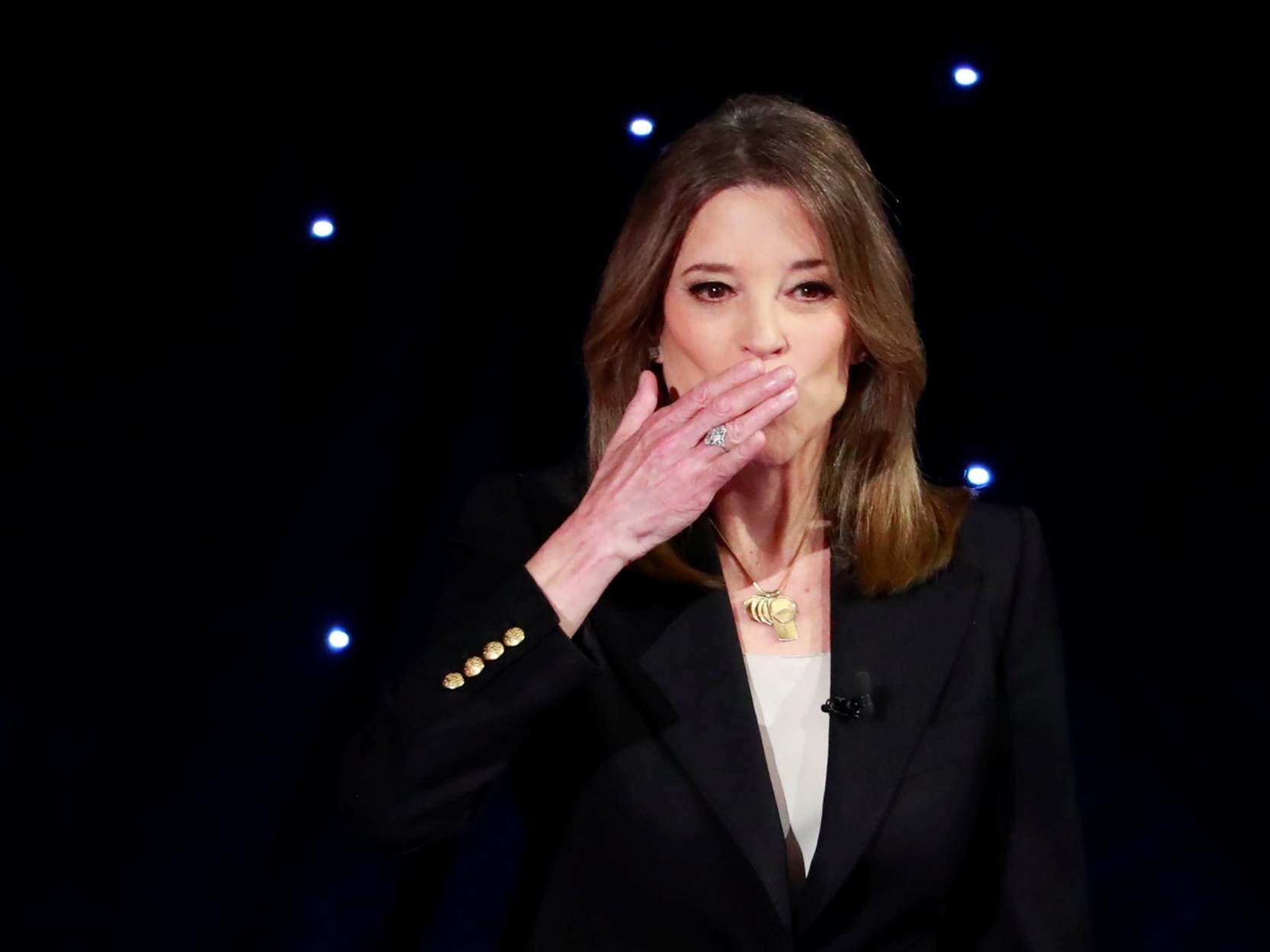 Candidate author Marianne Williamson blows a kiss before the first night of the second 2020 Democratic debate