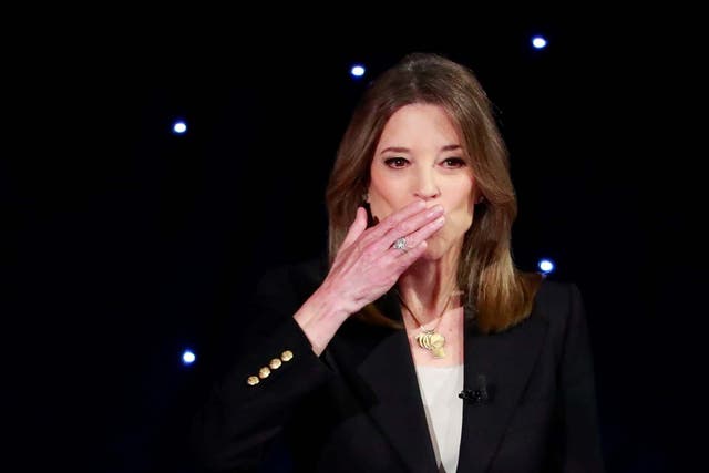 Candidate author Marianne Williamson blows a kiss before the first night of the second 2020 Democratic debate