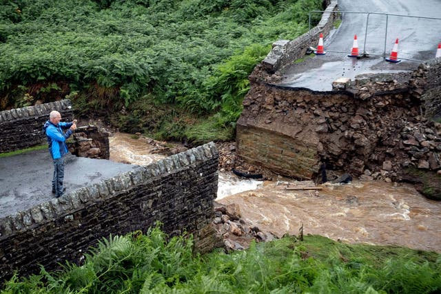 A collapsed bridge near Grinton, North Yorkshire, where more than 80mm of rain fell on Tuesday