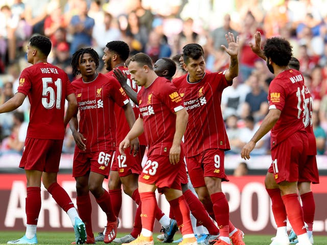 Liverpool celebrate Roberto Firmino's equaliser in 3-1 win