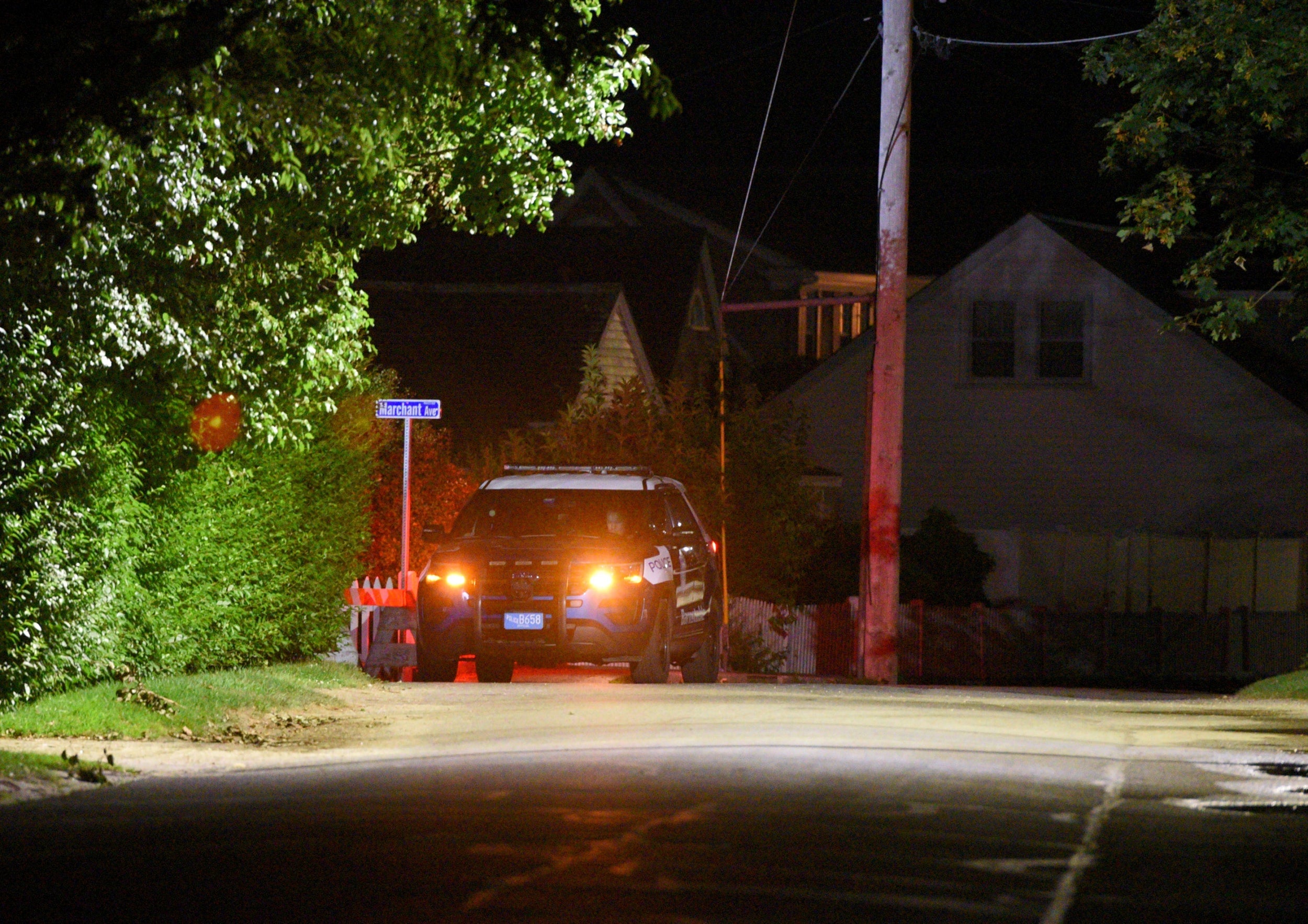 A Barnstable Police cruiser sits at the top of Marchant Avenue as police investigate Saoirse Kennedy Hill's death