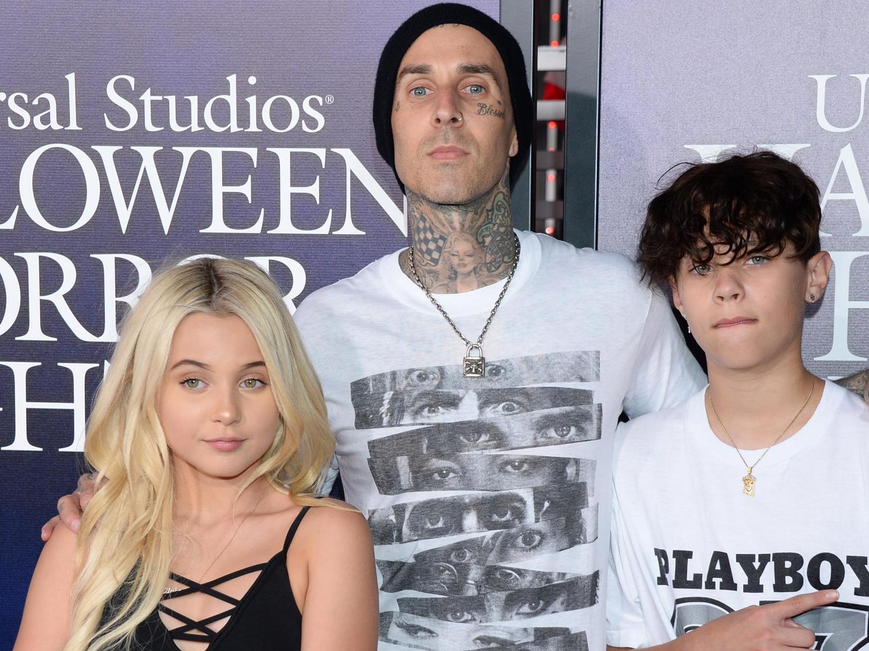 Travis Barker (centre) with his daughter Alabama and son, Landon
