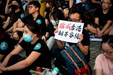 Hong Kong protesters vow to stand up to unprecedented riot charges