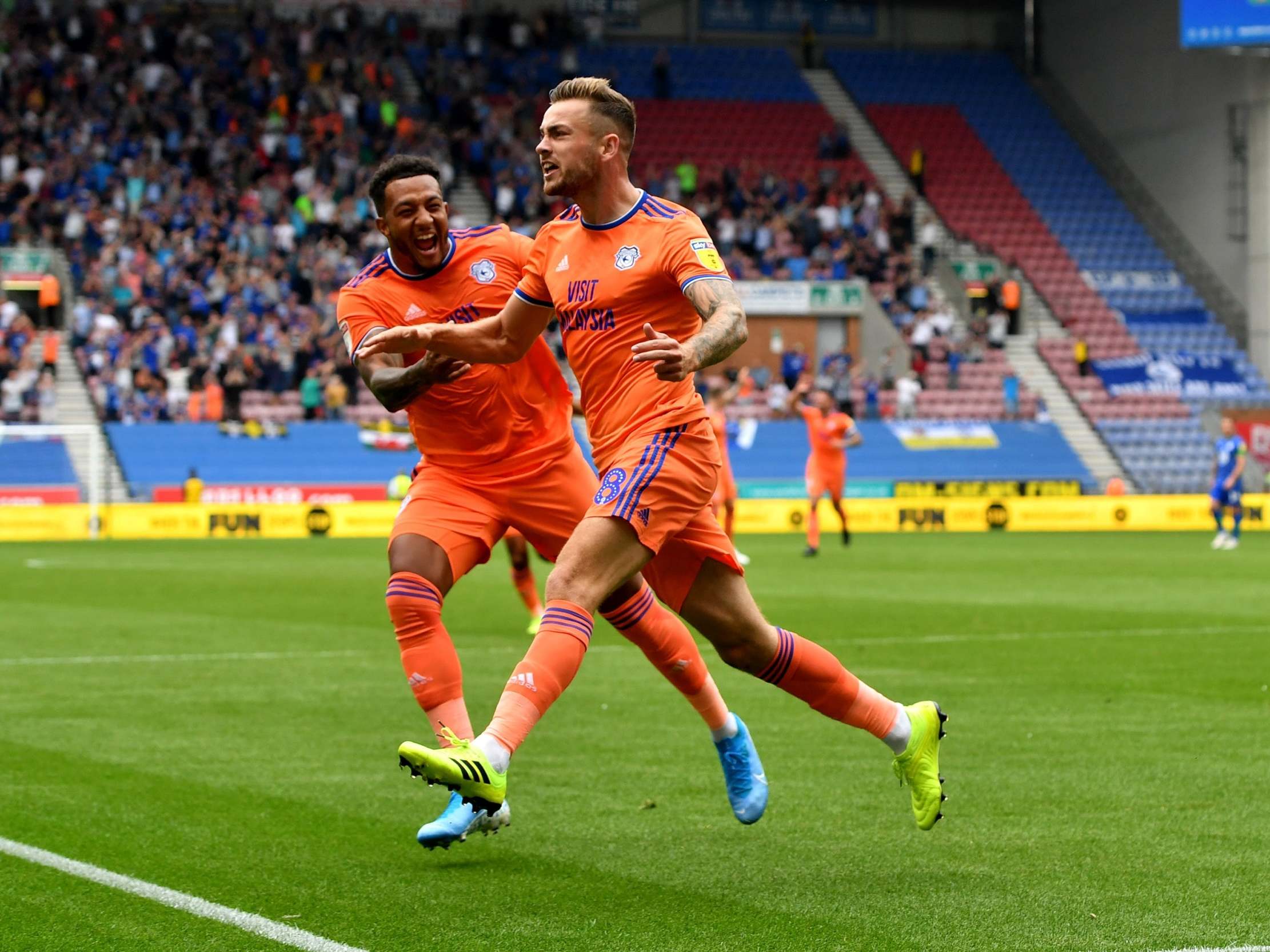 Joe Ralls celebrates scoring the first goal