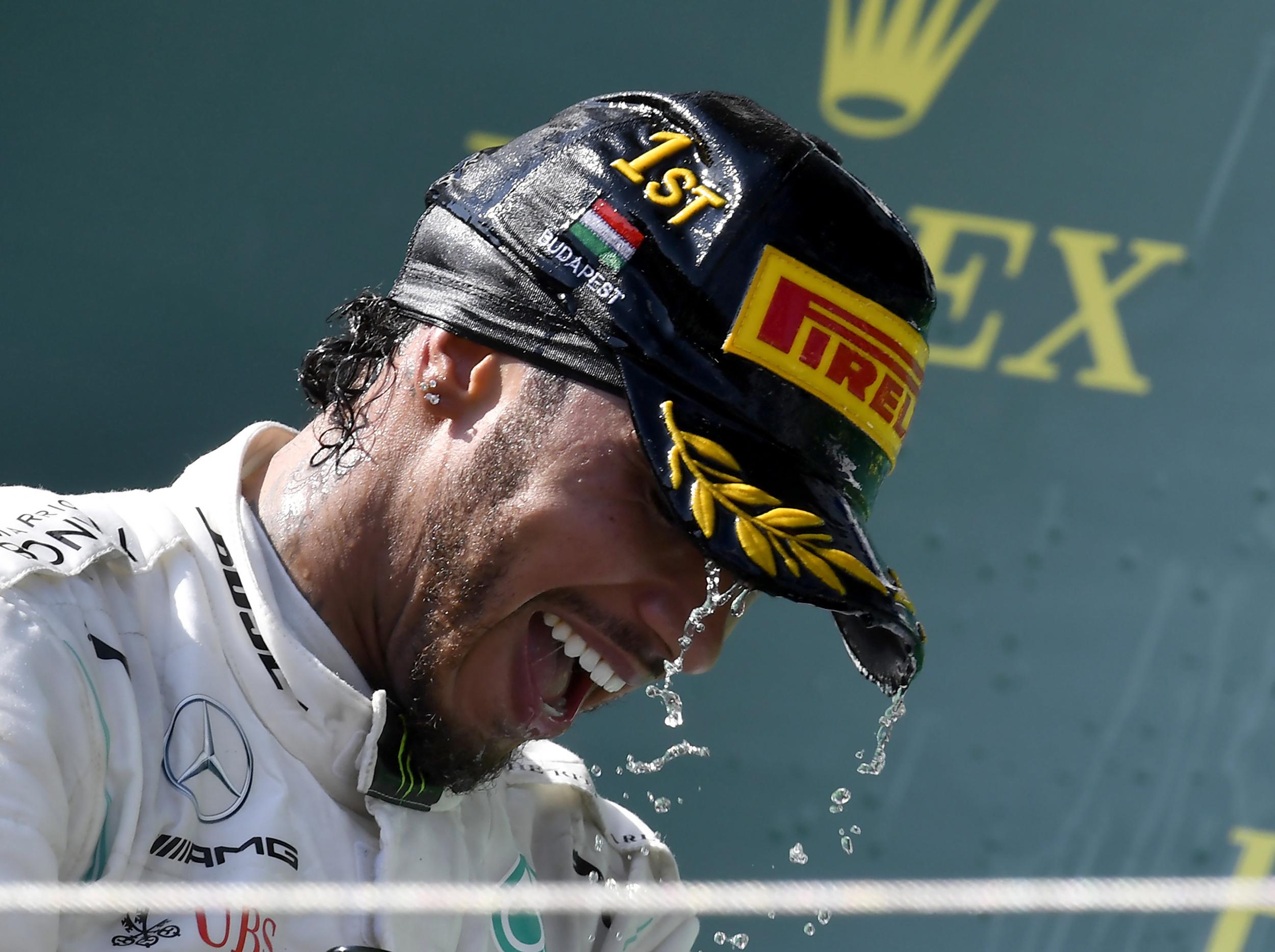 Lewis Hamilton celebrates his race win