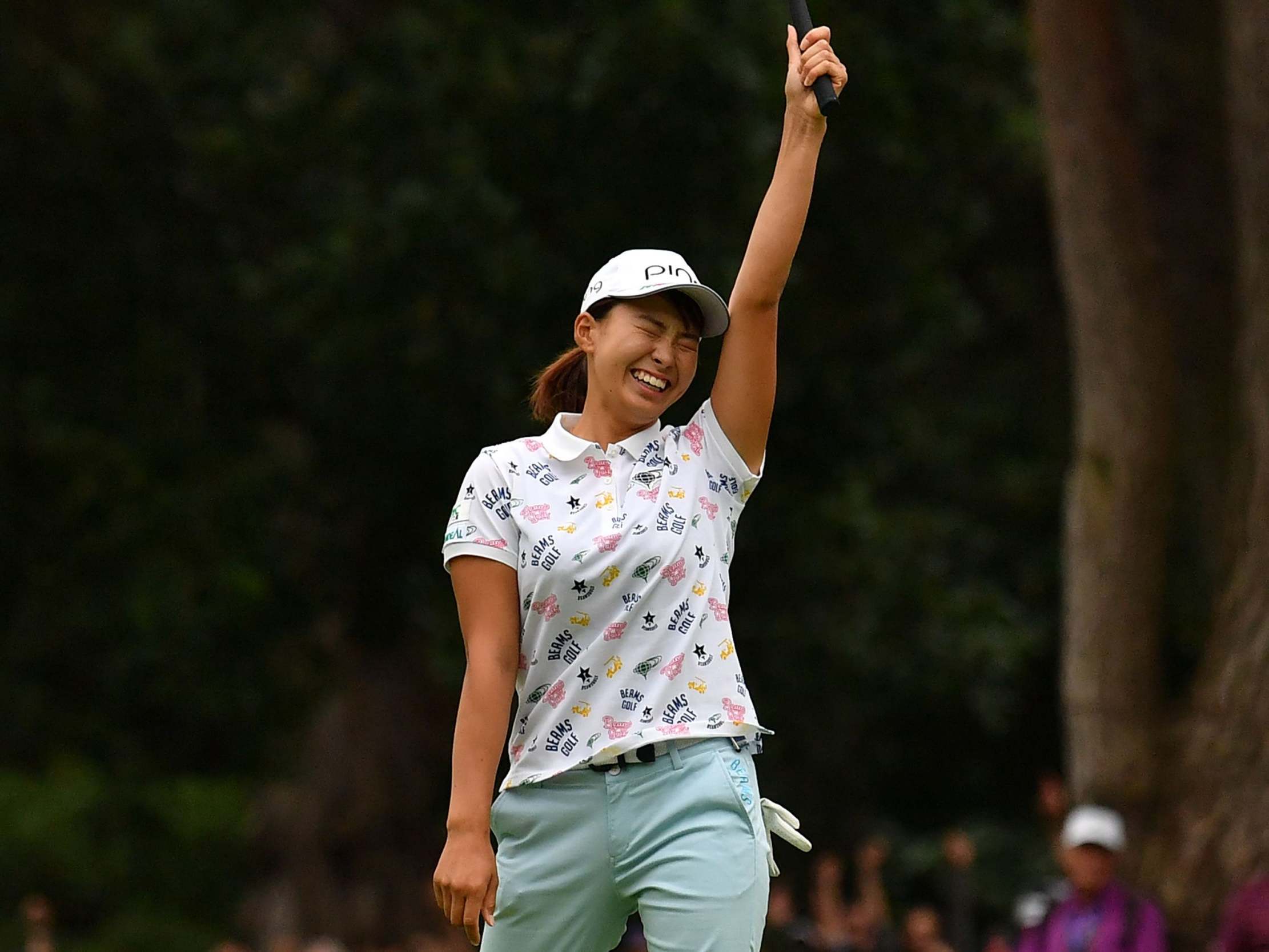 Hinako Shibuno reacts to holing the winning putt on the 18th green