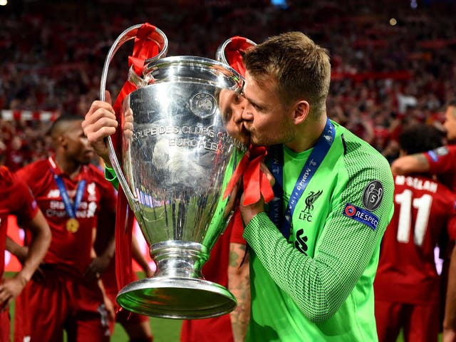 Liverpool goalkeeper Simon Mignolet celebrates with the European Cup