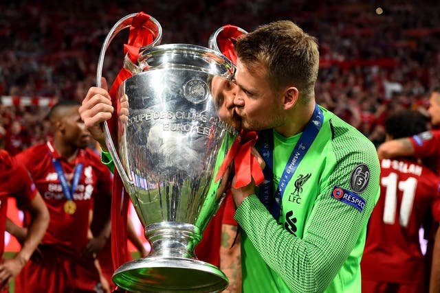 Liverpool goalkeeper Simon Mignolet celebrates with the European Cup
