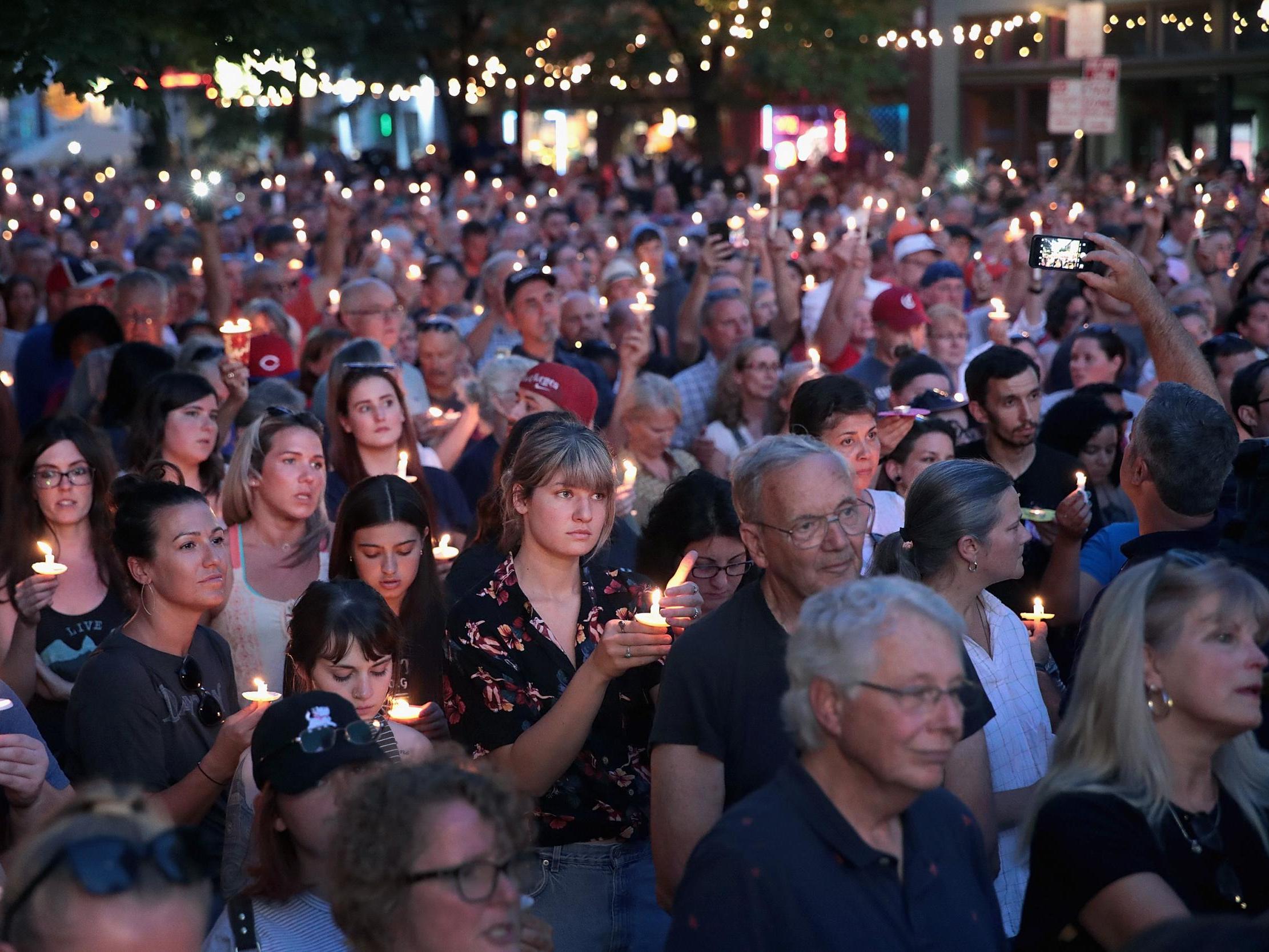 Hundreds turned out in Oregon District to remember the nine people killed in the second US mass shooting in 24 hours on Sunday