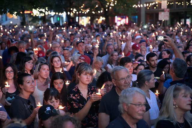 Hundreds turned out in Oregon District to remember the nine people killed in the second US mass shooting in 24 hours on Sunday