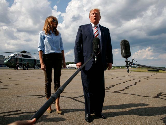 Donald Trump speaks to reporters about the two mass shootings before boarding Air Force One