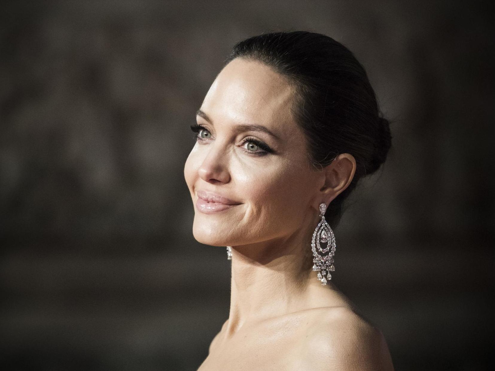 Angelina Jolie is waiting for the right man to meet her high standards